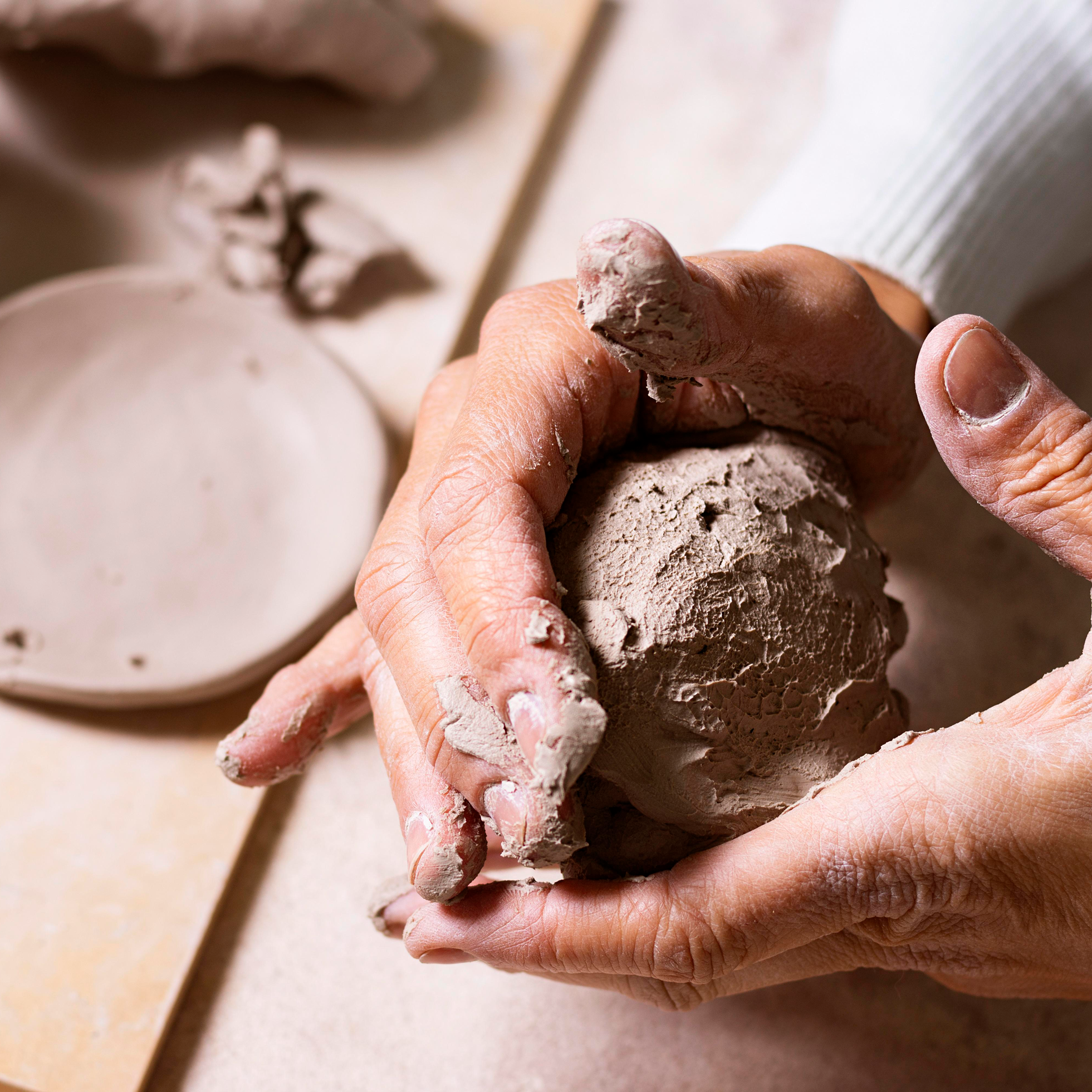 Mudbag clay kit with tools, mat, and clay ready for walk-in pottery at Artist for a Day.